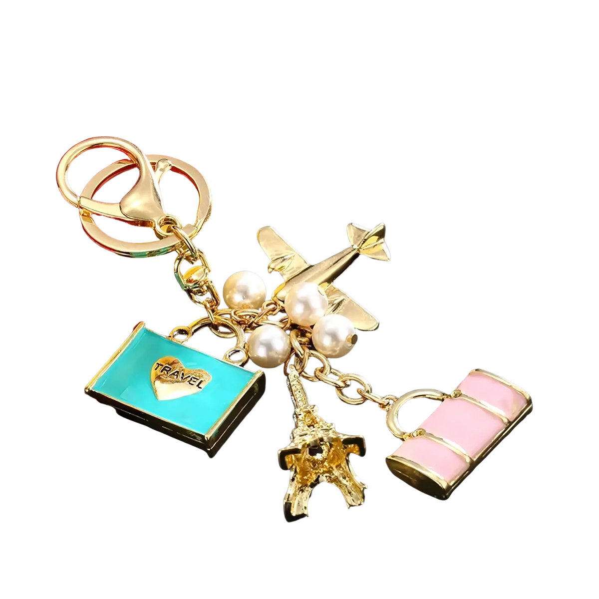 Gold-toned travel keychain with airplane Eiffel Tower pink suitcase turquoise travel tag and white pearls handbag charm