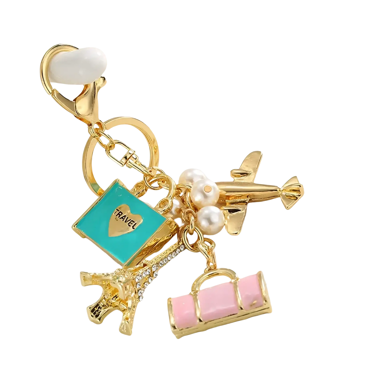 Gold-toned travel keychain with turquoise enamel heart tag, dangling pearls, airplane, Eiffel Tower, and pink suitcase charms