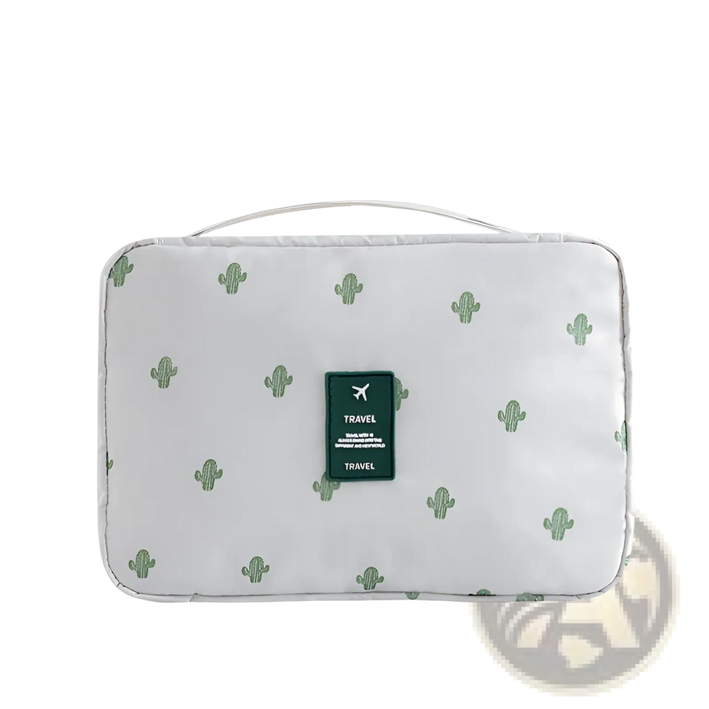 White cactus-patterned travel makeup bag hanging toiletry organizer with green travel label featuring airplane icon
