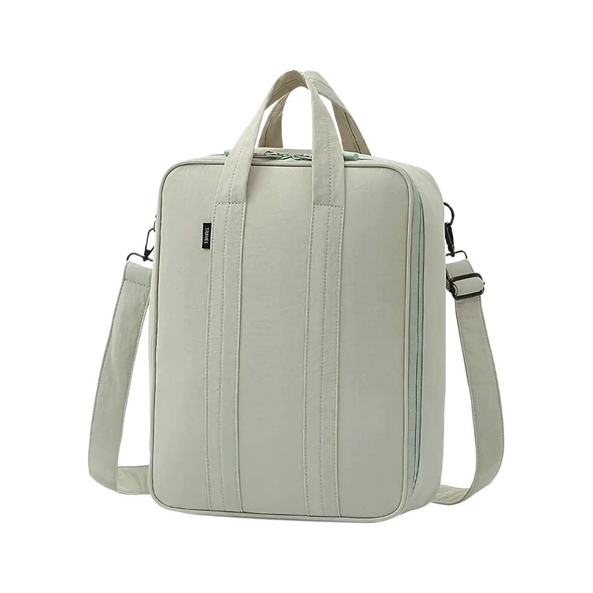 A sleek light green canvas travel packing cube with large capacity and dual handles for organized luggage