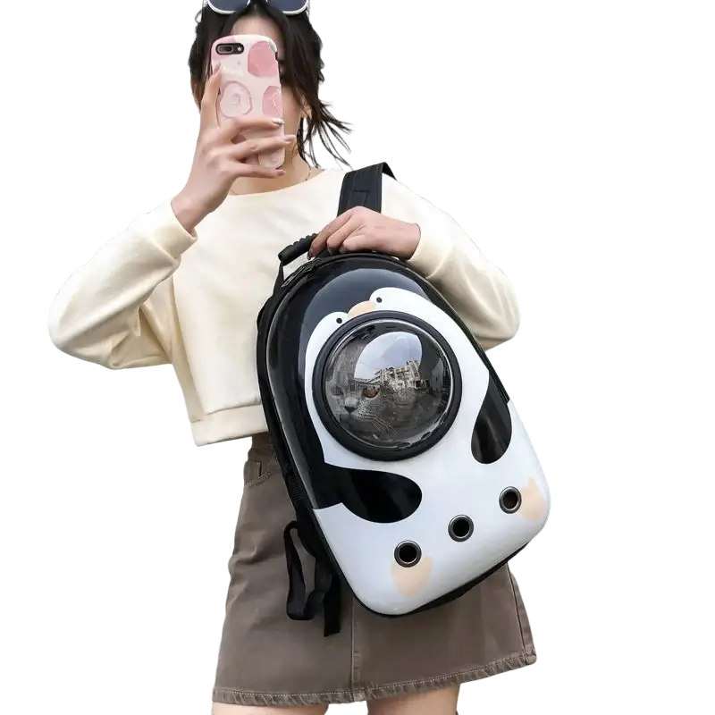 Black and white panda-themed travel puppy cat backpack with clear dome carrier showing a cat inside for outdoor travel puppy use
