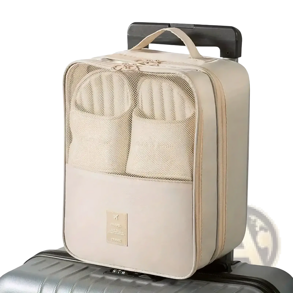 Beige travel shoe bag packing organizer with mesh compartments and top handle designed for luggage footwear storage