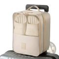 Beige travel shoe bag packing organizer with mesh compartments and top handle designed for luggage footwear storage