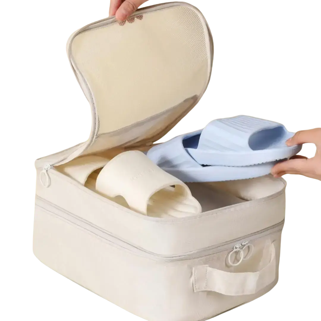 Beige mesh-top travel shoe bag with zipper closure and fabric handles for luggage packing organizer