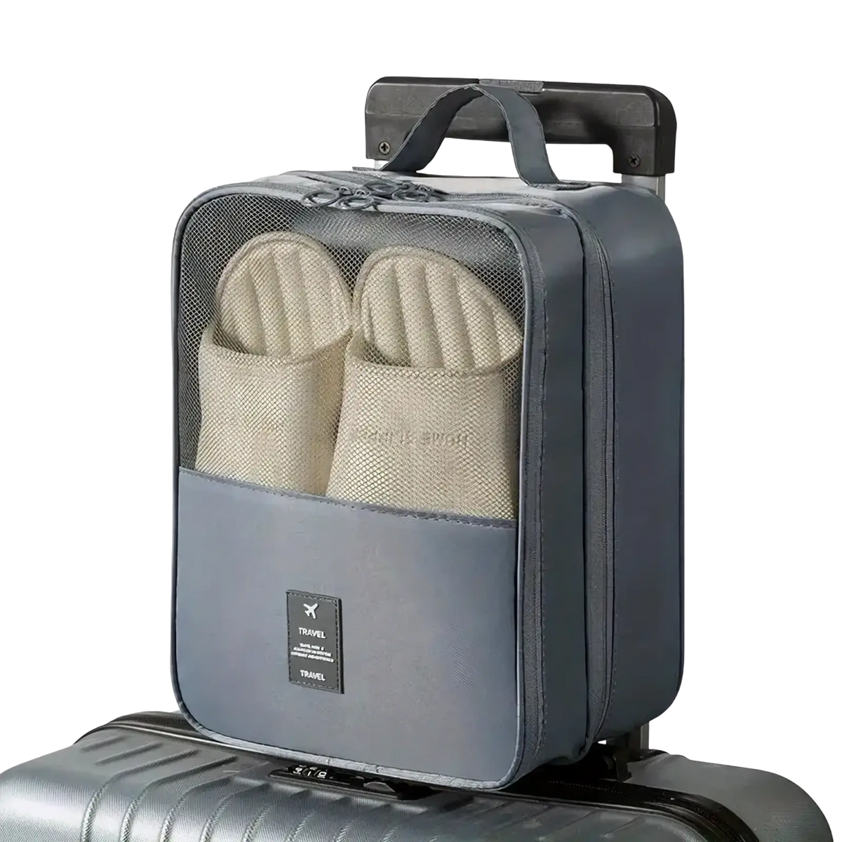 Gray mesh travel shoe bag packing organizer with black handle and zipper containing two beige slippers inside