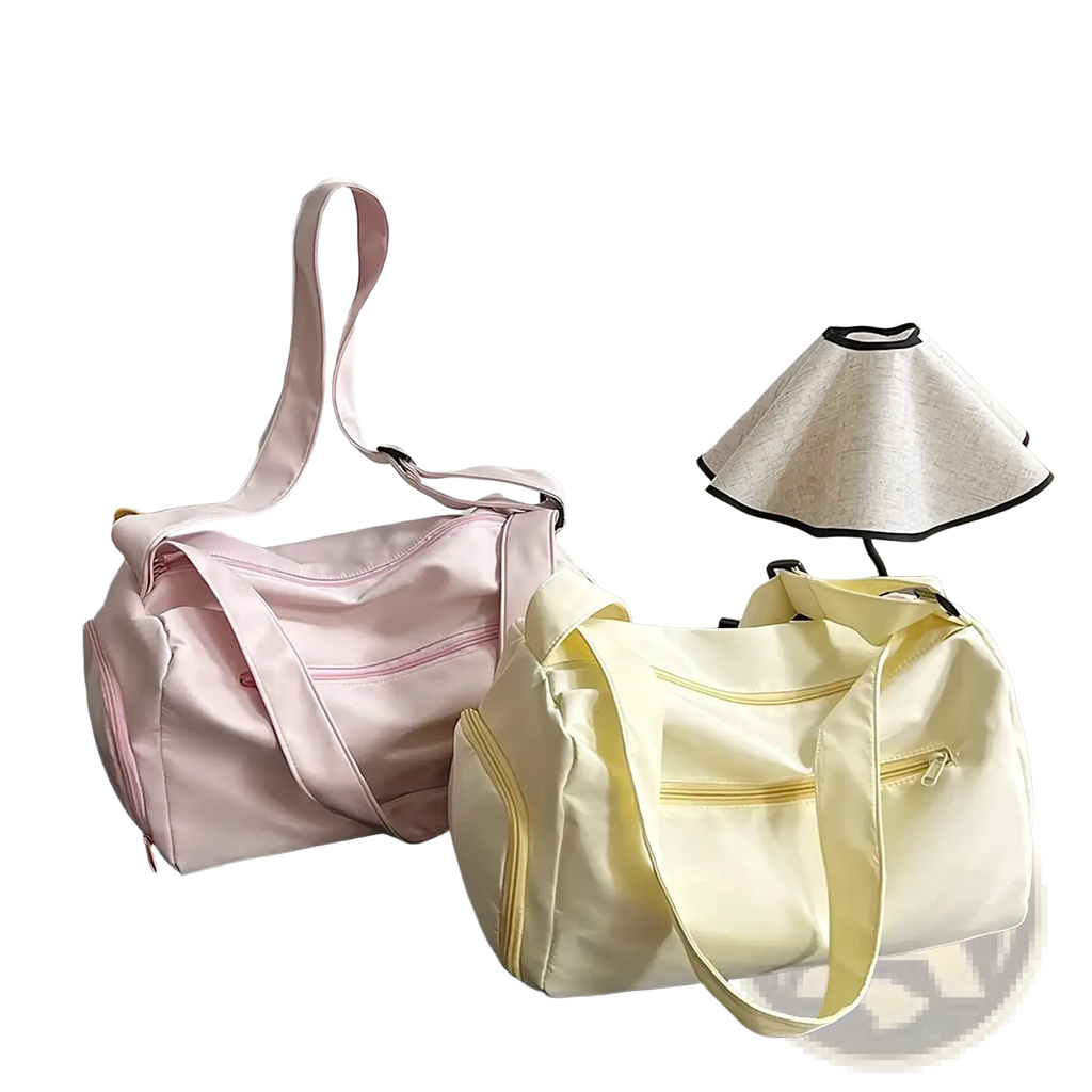 Two pastel-colored travel tote bags in soft pink and pale yellow made of lightweight nylon with matching zipper pulls