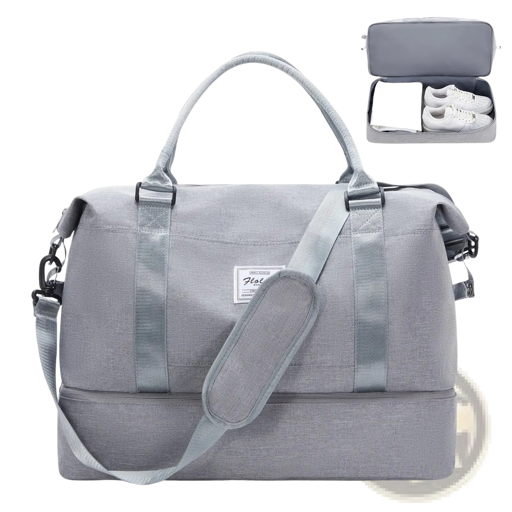Gray textured fabric travel tote bag with matching shoulder strap and top handles featuring shoe compartment