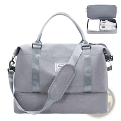 Gray textured fabric travel tote bag with matching shoulder strap and top handles featuring shoe compartment