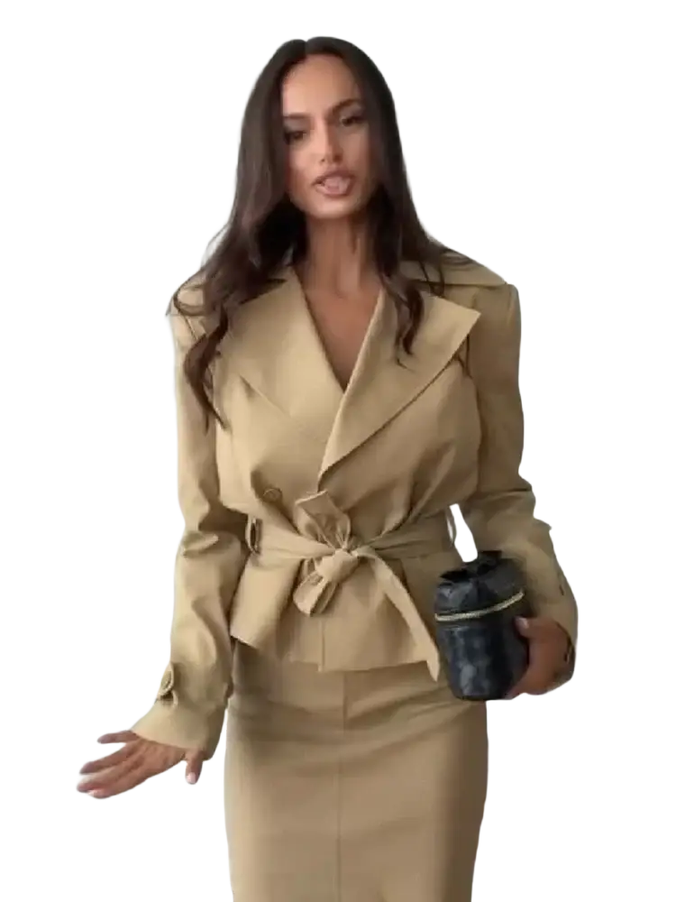 Black textured clutch with gold trim complementing the trench co-ord skirt set for elegant occasions