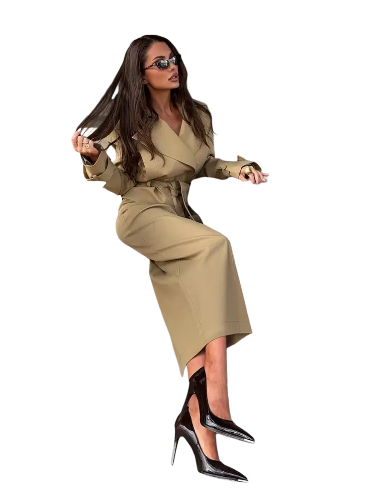 A pair of glossy black patent leather stiletto heels with pointed toe and thin high heel for trench co-ord skirt set