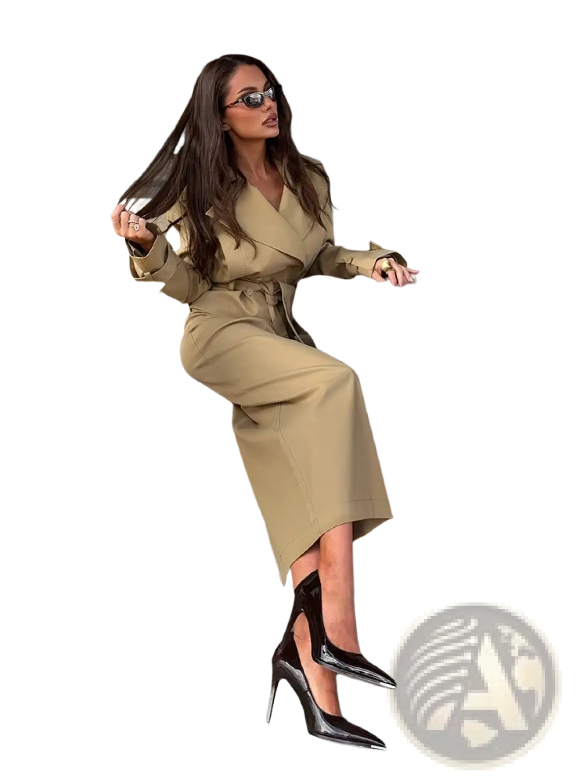 A pair of glossy black patent leather stiletto heels with pointed toe and thin high heel for trench co-ord skirt set