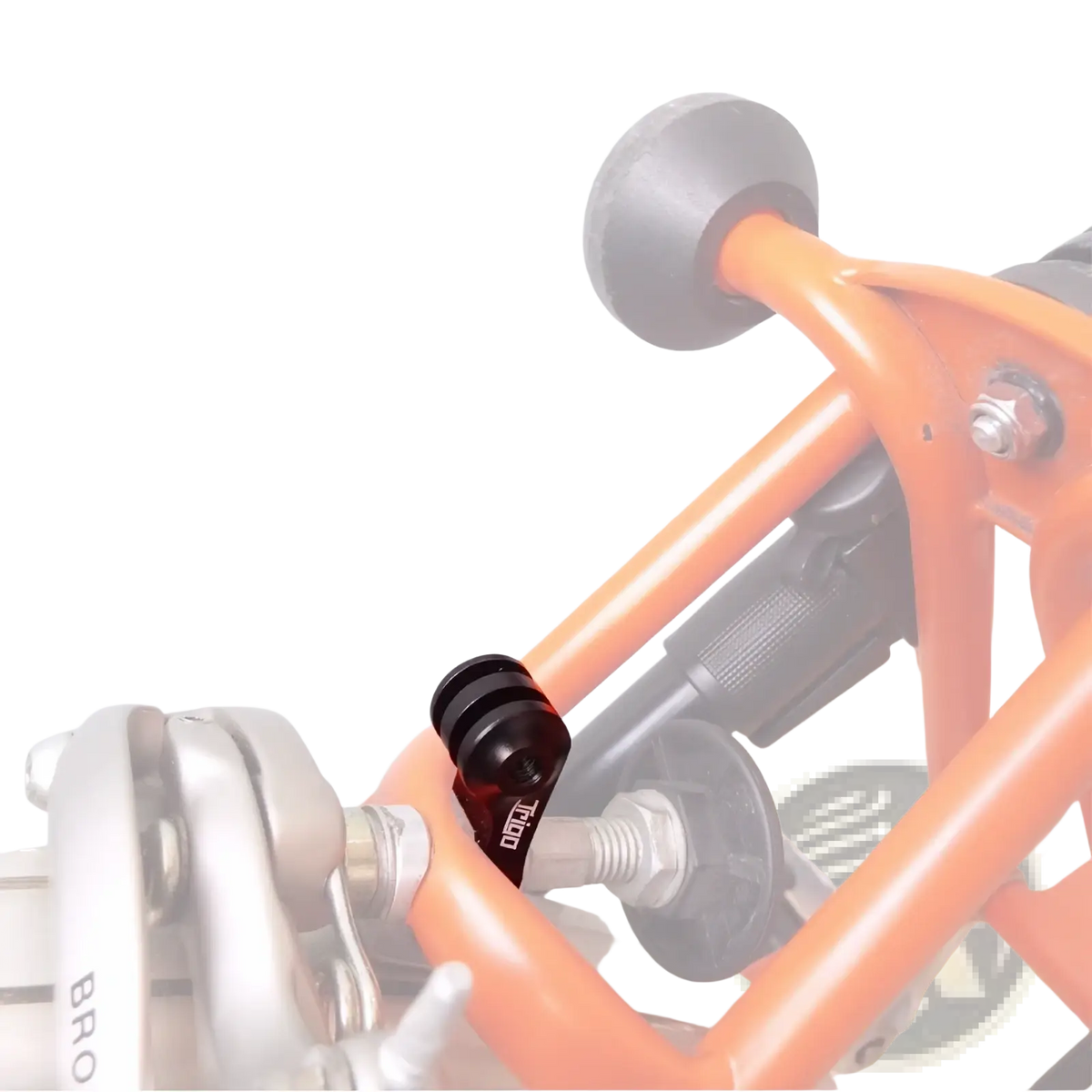 Orange bicycle frame with black rubberized handlebar grips and metallic brake components featuring Trigo Brompton camera mount bracket