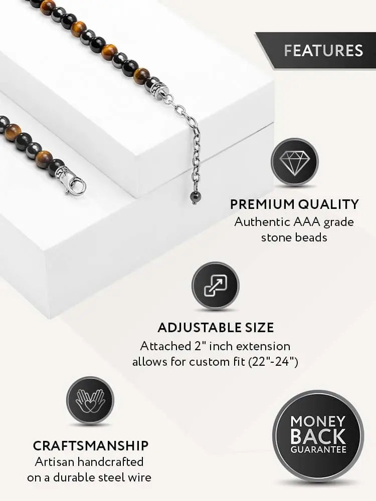 A sleek adjustable bracelet with alternating tiger eye and black hematite beads on steel wire with silver clasp