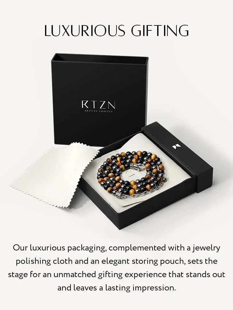Black and gold tiger eye bead bracelet with silver clasp in sleek black rtzn gift box for triple protection necklace