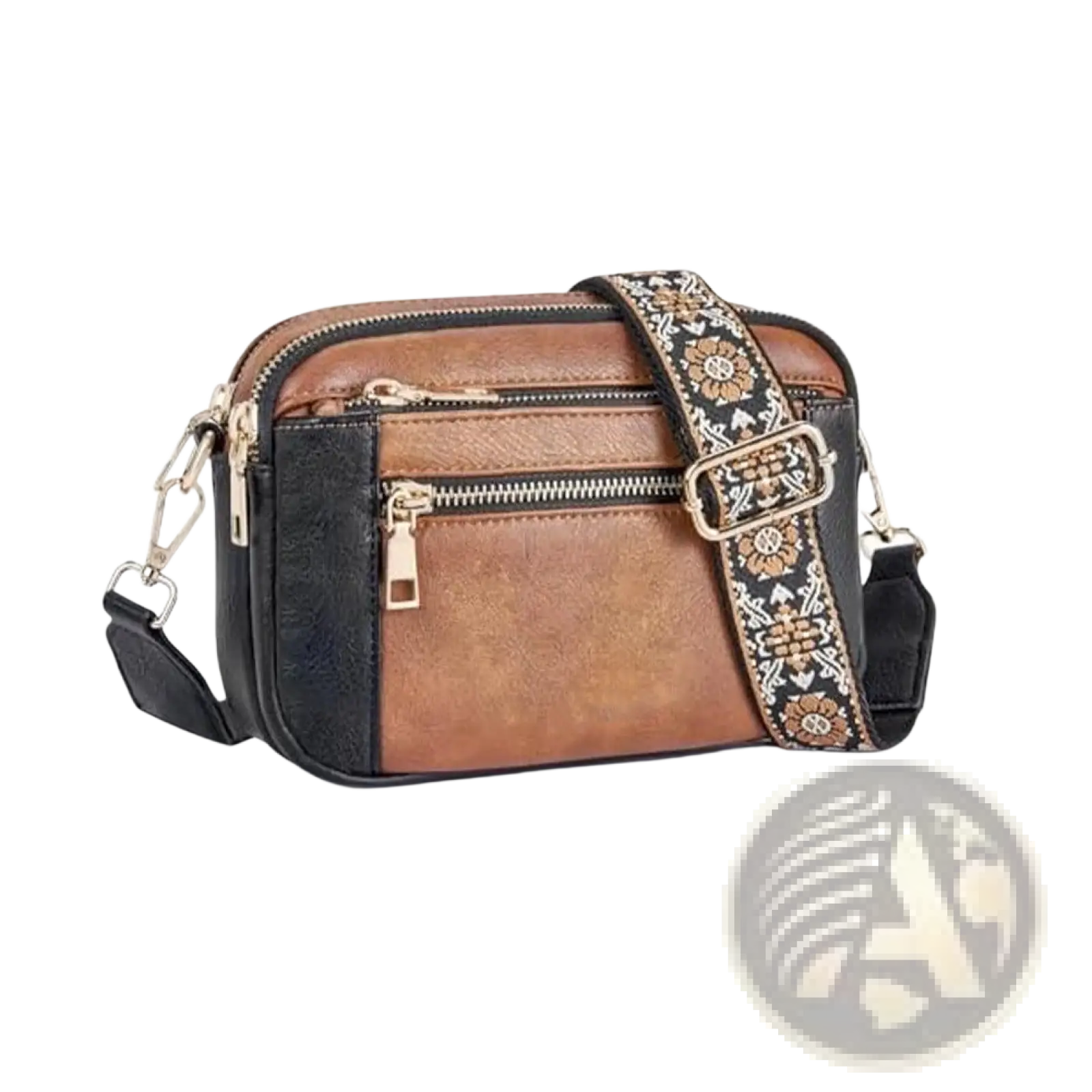 Brown and black colorblock triple zipper crossbody bag with a floral-patterned strap for hands-free use