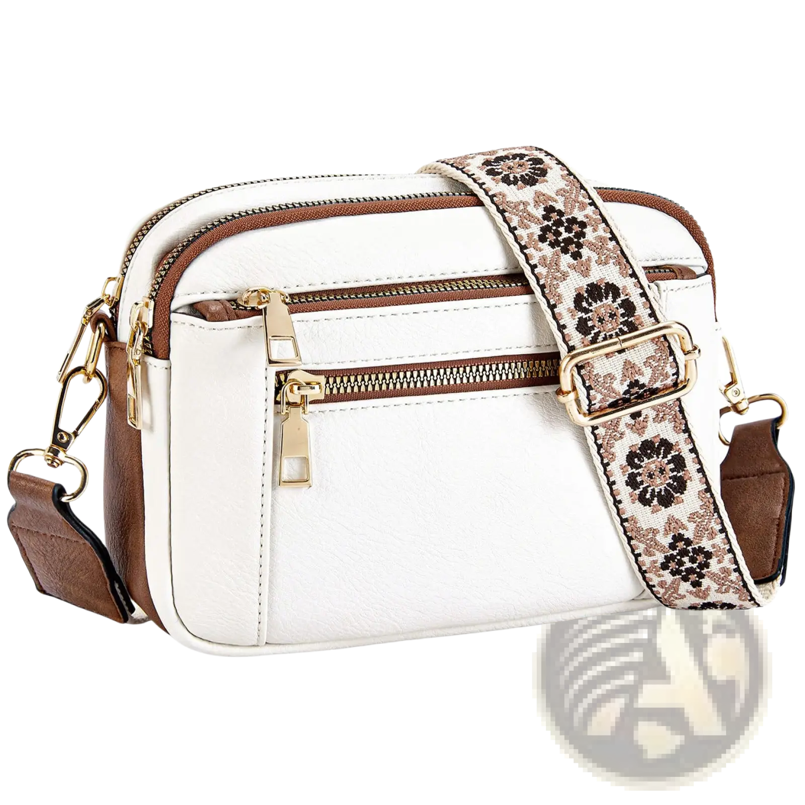 White and brown colorblock triple zipper crossbody bag with a floral-patterned strap for versatile use