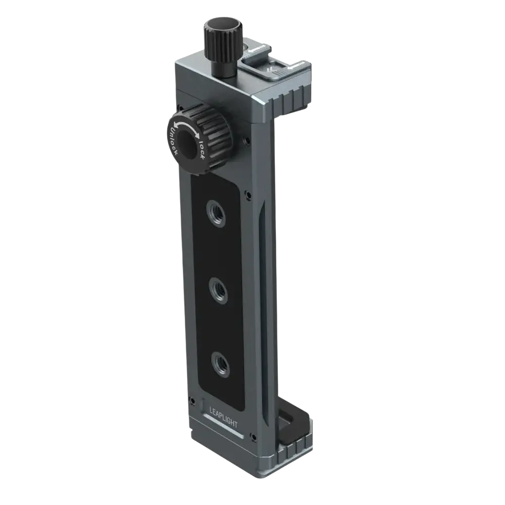 Dark gray aluminum tripod mount adapter with black textured knobs and three threaded mounting holes for universal use
