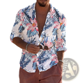 A man wearing a white long sleeve mens beach shirt with vibrant pink and blue tropical floral patterns