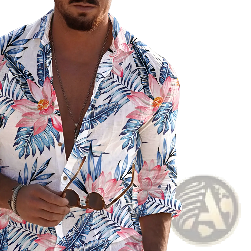 A man wearing a white blue and pink tropical print long sleeve mens beach shirt with rolled sleeves