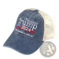 Blue denim trucker hat with beige mesh back embroidered with president trump 2024 and keep america great slogans