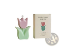 Tulip flower scented candle shaped like a pastel pink and mint green tulip with a white wick for room decor