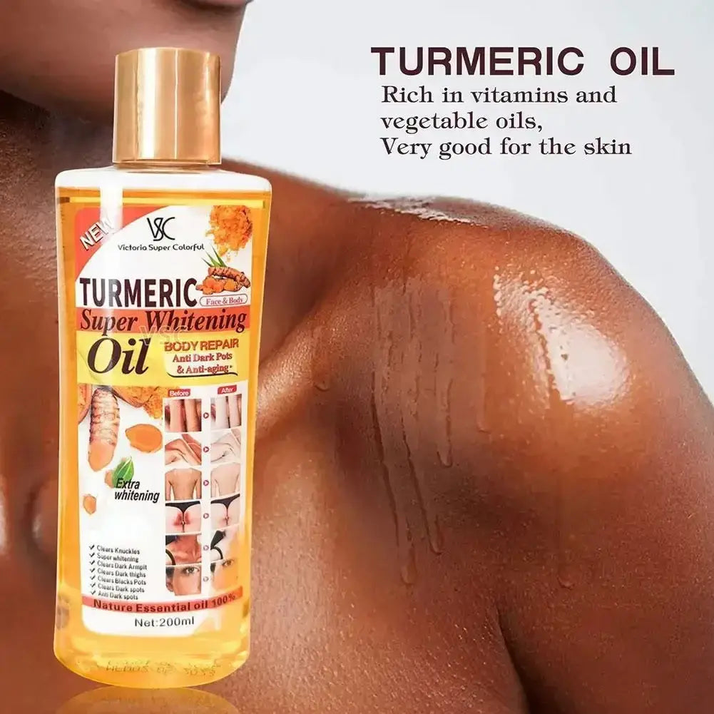 A clear bottle of victoria turmeric essential oil with a gold cap and yellow label for moisturizing body and face care