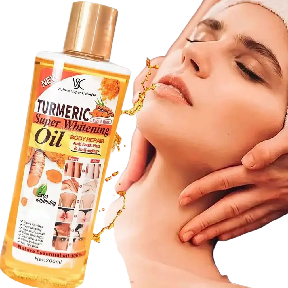 A clear bottle of victoria super colorful turmeric essential oil with amber liquid and gold cap for body repair and anti-dark spot care