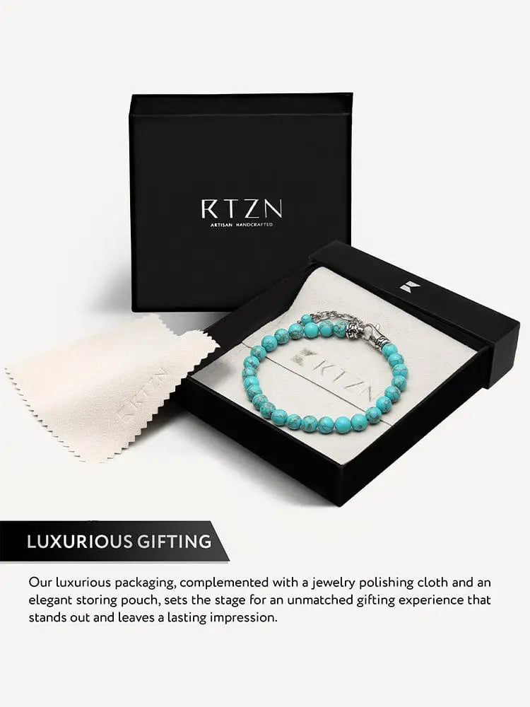 Authentic turquoise stone beaded bracelet with silver clasp displayed in an rtzn branded gift box