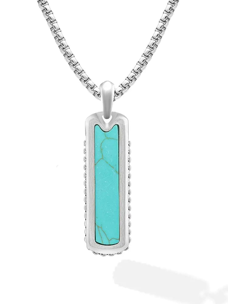 Silver-toned men’s turquoise column pendant with natural veining on a stainless steel box chain necklace