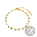 Gold-toned chain bracelet with turquoise-centered daisy flower charms from turquoise daisy gold chain necklace and bracelet set