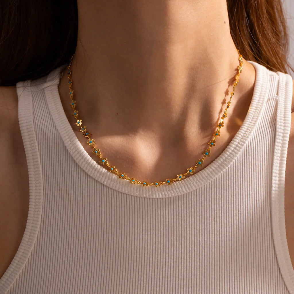 Turquoise daisy gold chain necklace and bracelet set with delicate gold chain and sparkling blue floral gemstones