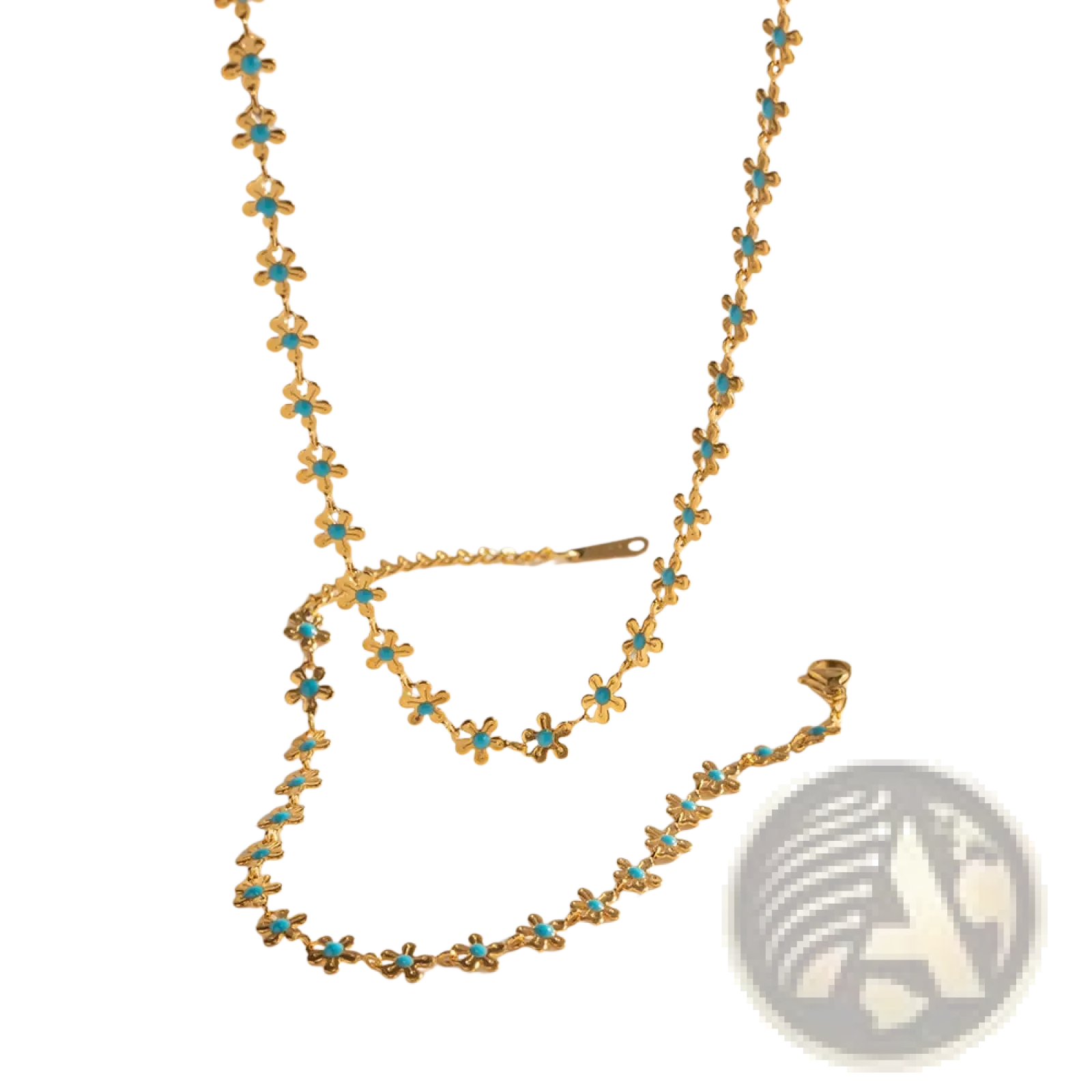 A delicate gold chain necklace adorned with tiny turquoise flower charms from the turquoise daisy set