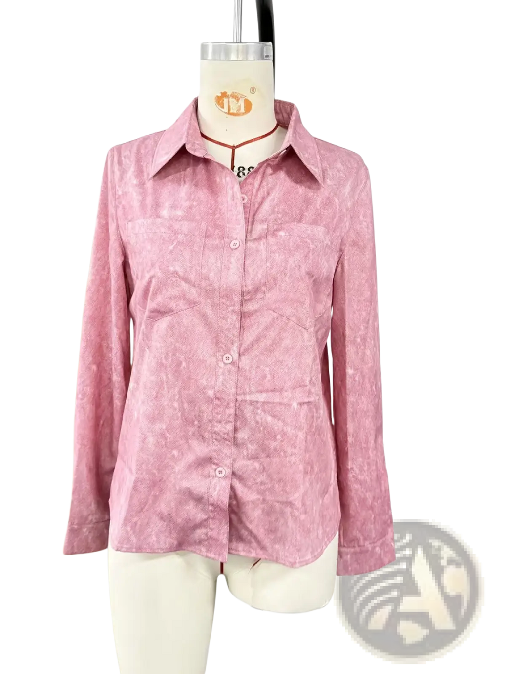 Pink long-sleeved button-up shirt with a subtle textured pattern paired with turquoise distressed denim lapel shirt