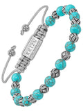 Native turquoise and silver beaded bracelet with turquoise and black patterned beads and silver-toned toggle clasp