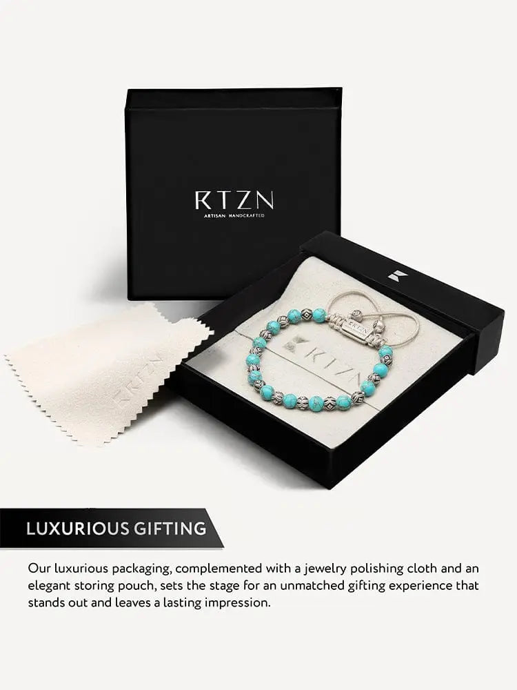 Native turquoise and silver beaded bracelet with toggle clasp featuring a sleek minimalist design