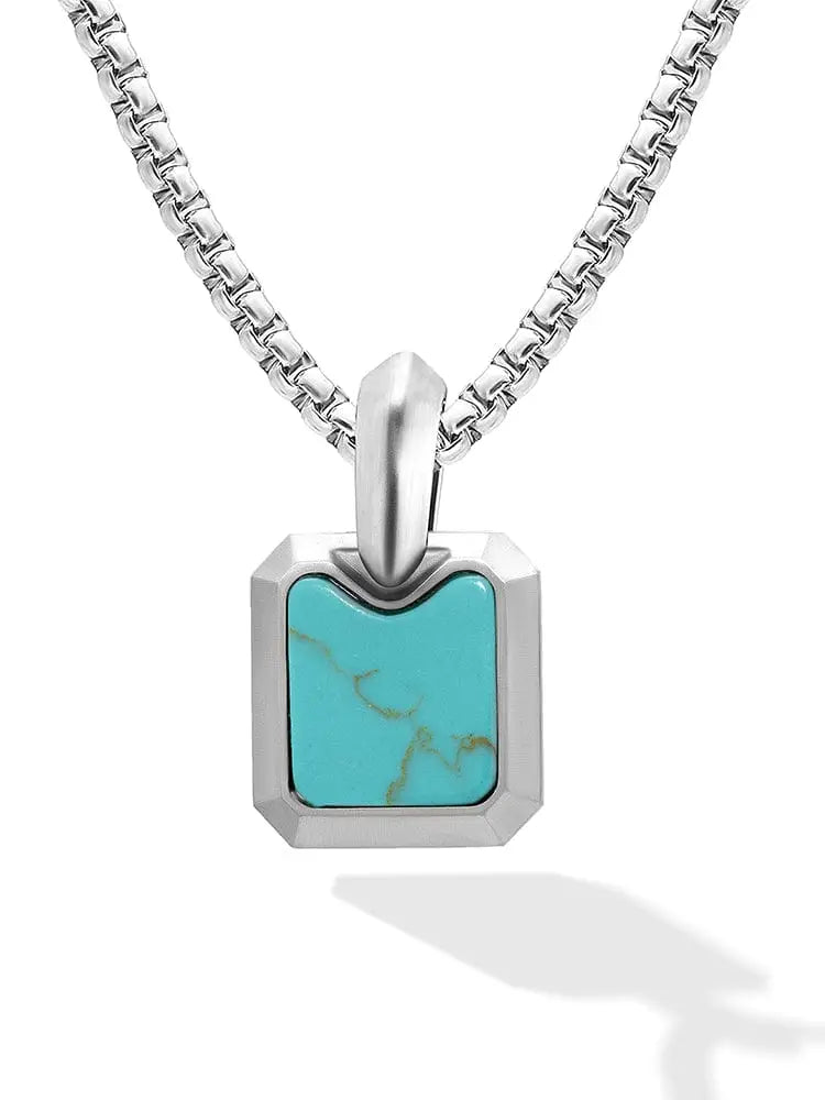 Silver-toned brushed stainless steel rectangular pendant necklace with vibrant turquoise stone inset