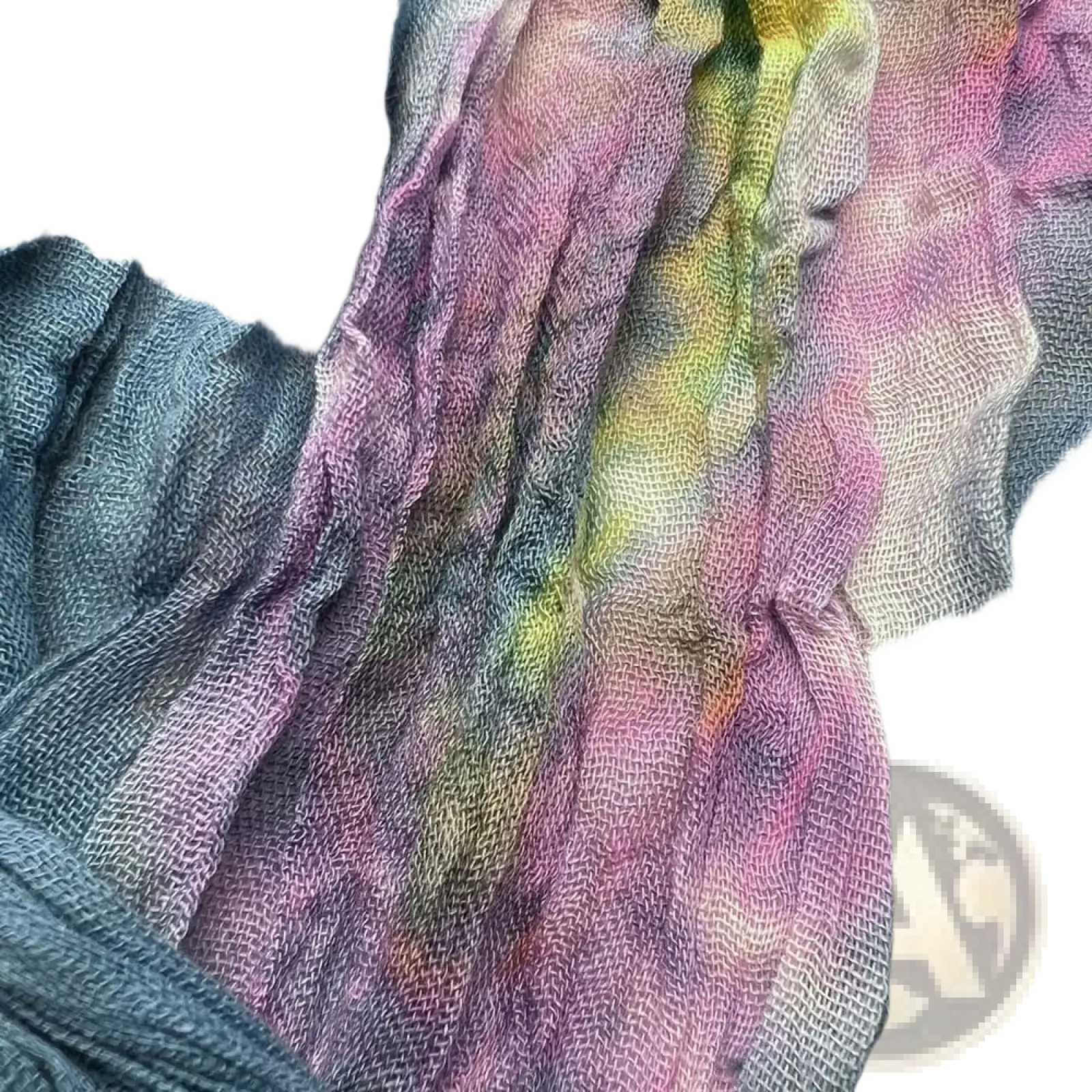 A soft crinkle cotton scarf with a vibrant turquoise tie dye pattern in pink yellow and blue shades