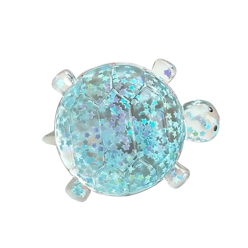 Translucent blue glitter-filled turtle toy fidget toy with hexagonal shell pattern and clear plastic limbs for stress relief