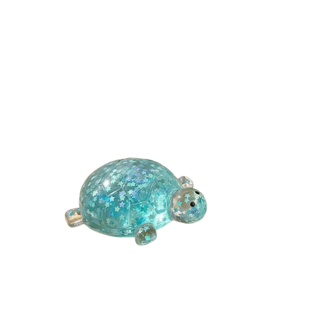 A translucent turquoise turtle toy fidget toy stress ball filled with sparkling star glitter for squeeze relief