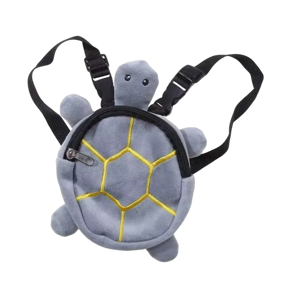 Gray plush turtle shape dog backpack with yellow stitched shell pattern and black adjustable straps for pets