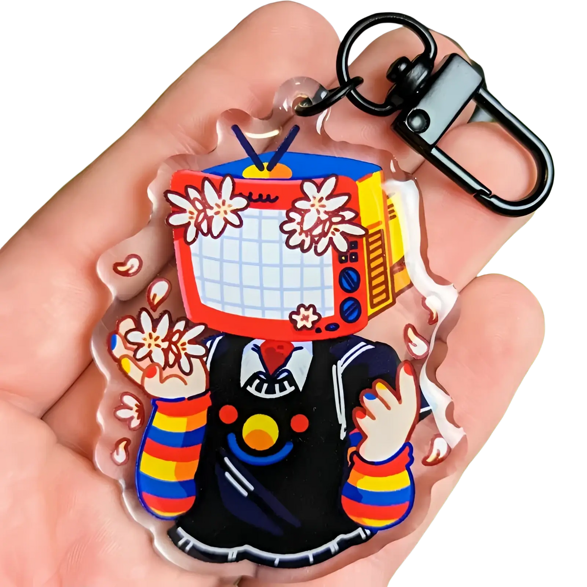 Colorful acrylic tv head anime keychain with vintage television head, white flowers, and rainbow-striped sleeves bag charm