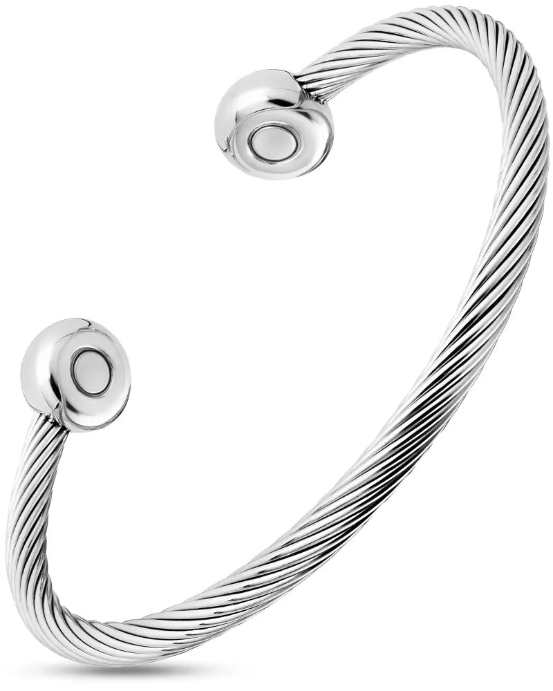 Twisted silver cable magnetic cuff bracelet with black beads and a silver magnetic clasp displayed on a white background