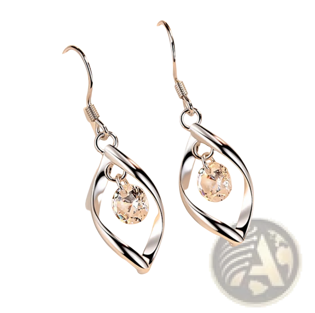 Twisted teardrop silver earrings with faceted crystal accents featuring a twisted teardrop design and clear crystals