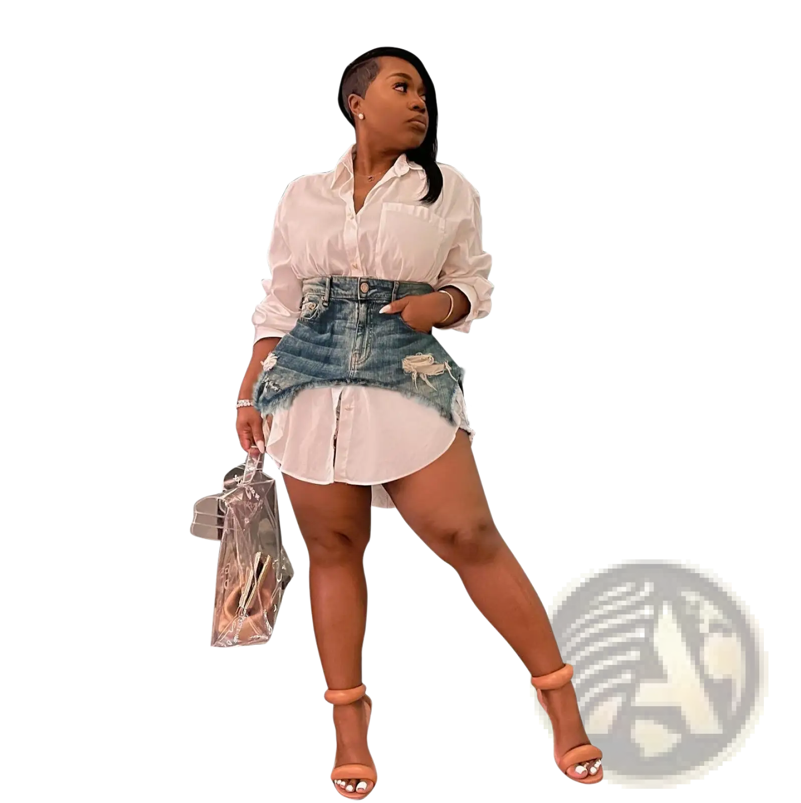 Woman wearing a two piece denim mini skirt and white button up shirt set holding a clear plastic handbag