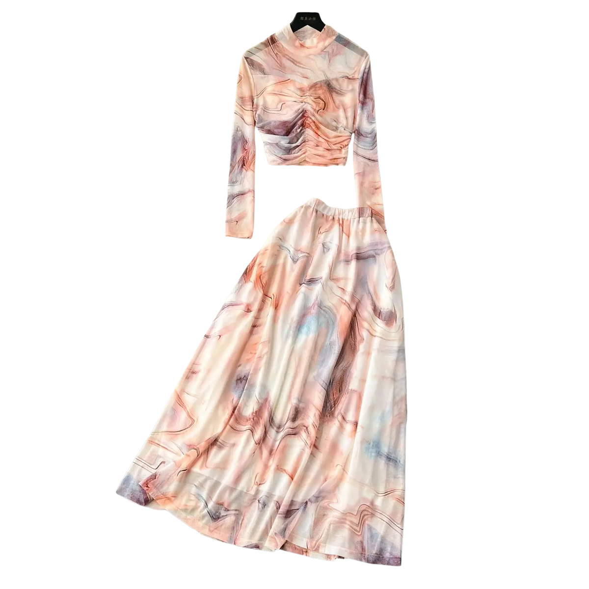 A two piece mesh skirt set with elastic closure featuring a flowing high neck top and matching marble print maxi skirt on sheer fabric