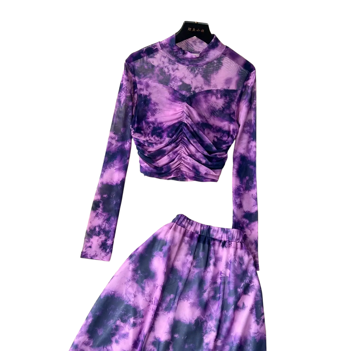 Purple and navy tie-dye long-sleeved crop top with ruched bodice featured in two piece mesh skirt set with elastic closure type