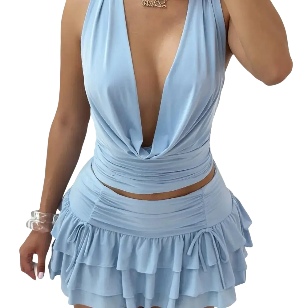 A light blue ruched halter two piece mini skirt set with deep plunging neckline and pullover closure type