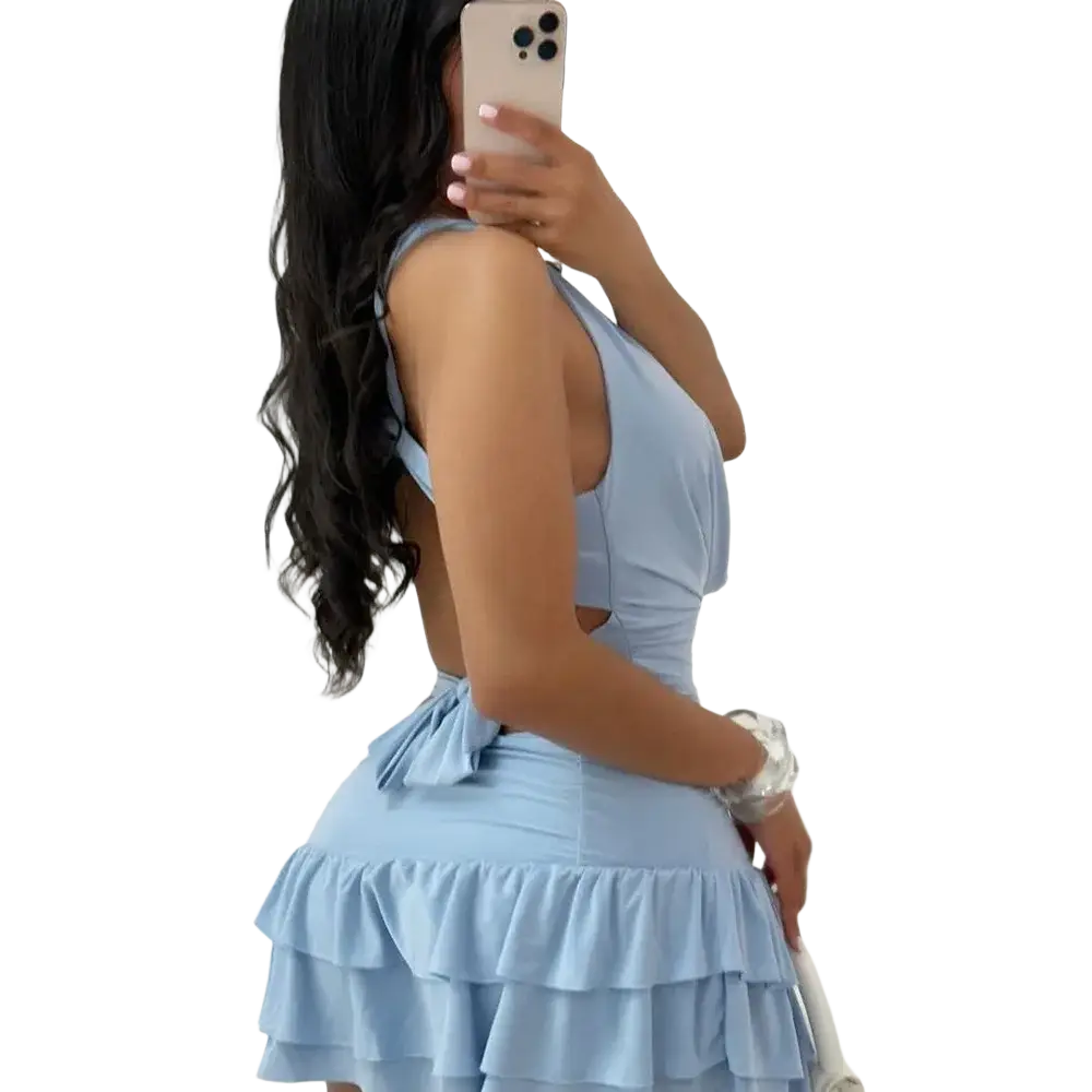 A light blue sleeveless dress with halter neckline and ruffled tiers featuring pullover closure type