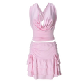 A soft pink two piece mini skirt set with pullover closure featuring a sleeveless halter top and ruched tiered skirt