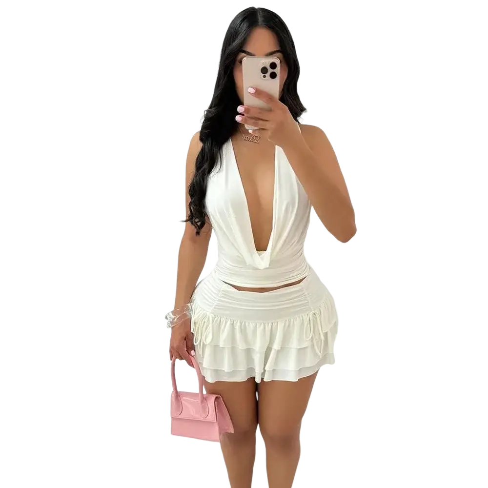 White satin halter neck two piece mini skirt set with ruffled skirt and pullover closure type and plunging neckline